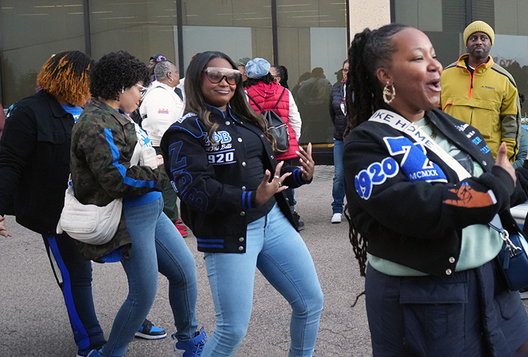 Three young women dancing