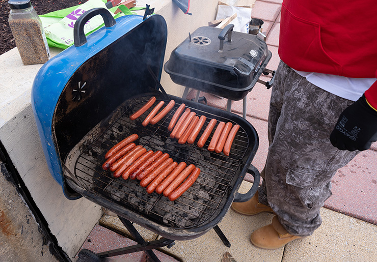 Hotdogs on a grill