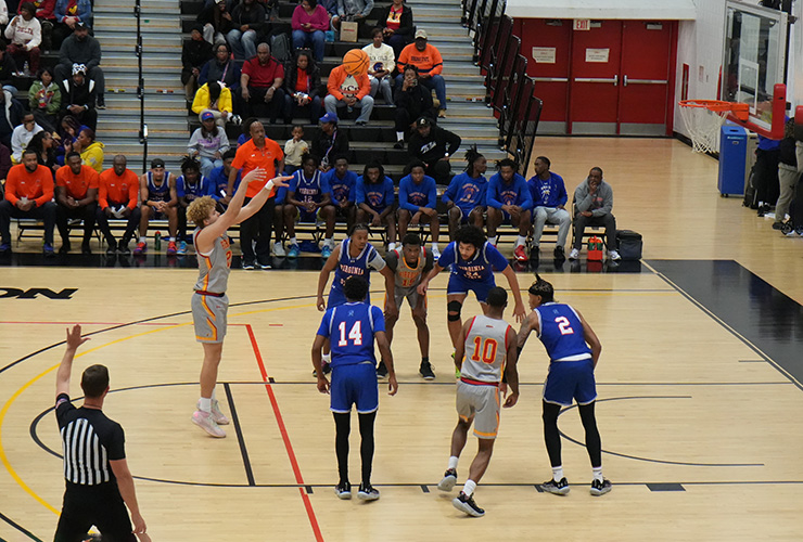 UDC men's basketball team playing the Homecoming game