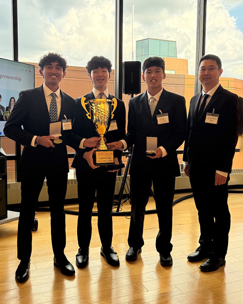 2025 Champion Team with Competition Chair, Dr. Jian Hua
