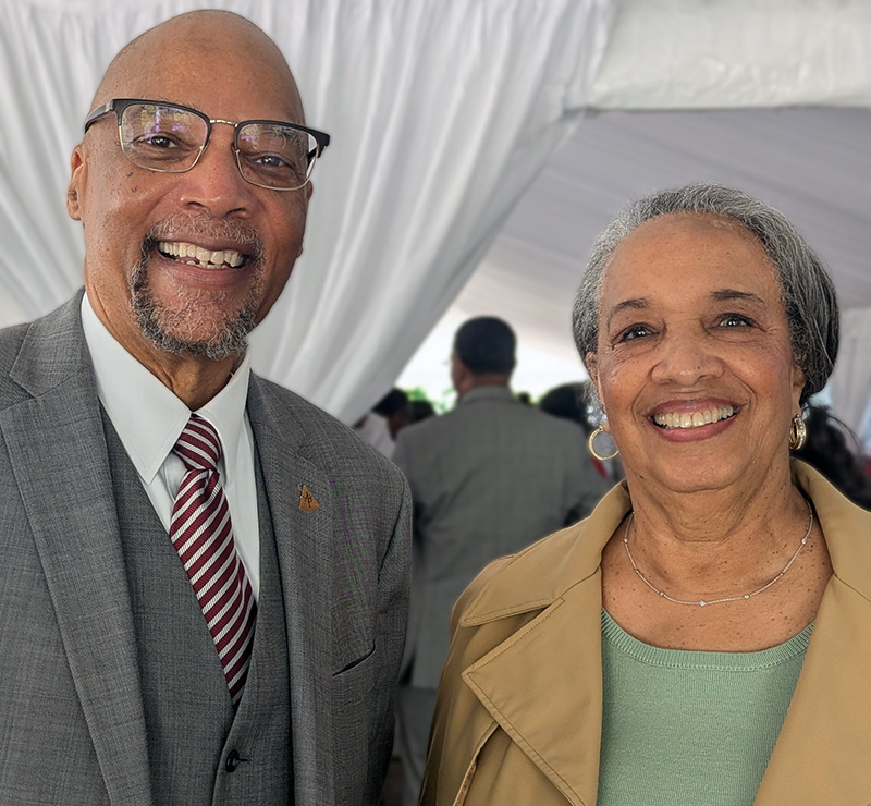 Rachel Petty standing next to an older man.