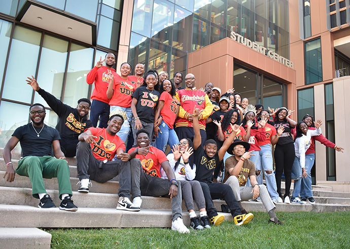 UDC students around UDC President Edington on the student center steps