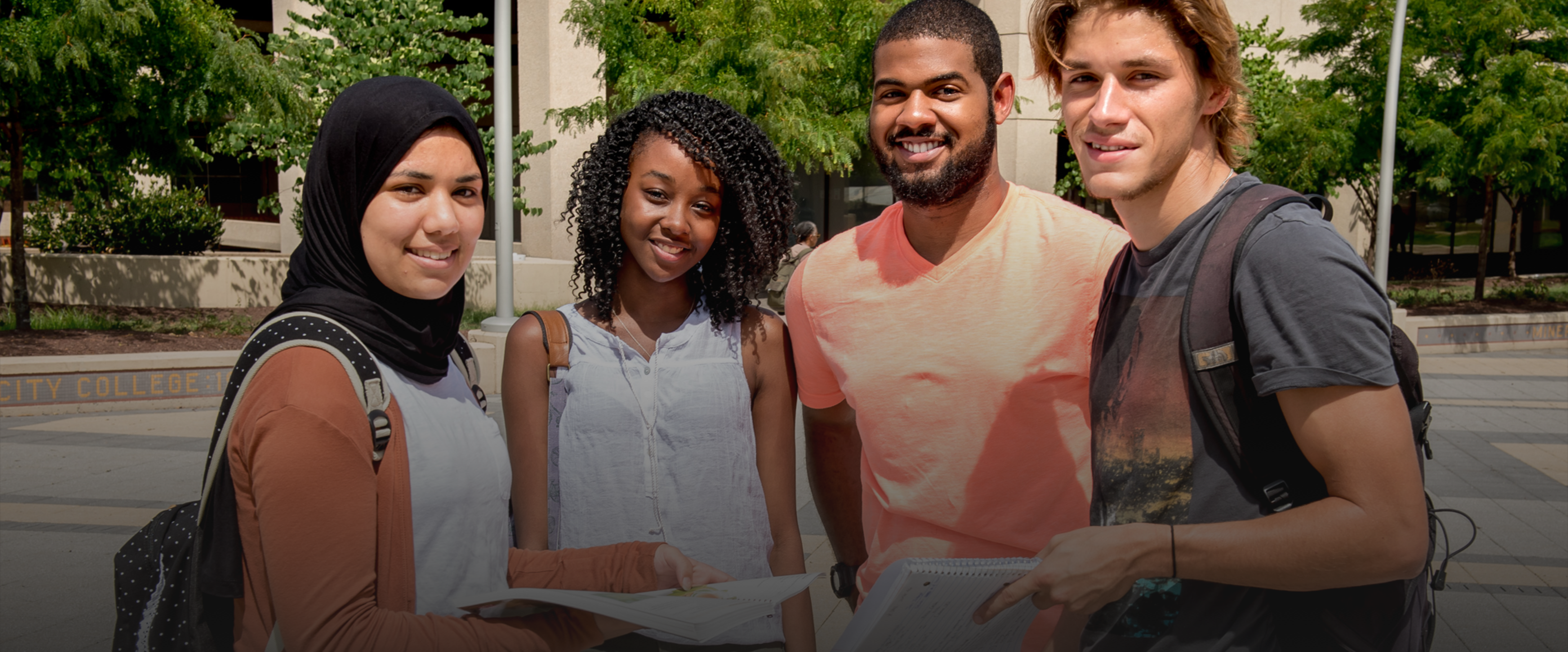 Students posing for picture on UDC campus