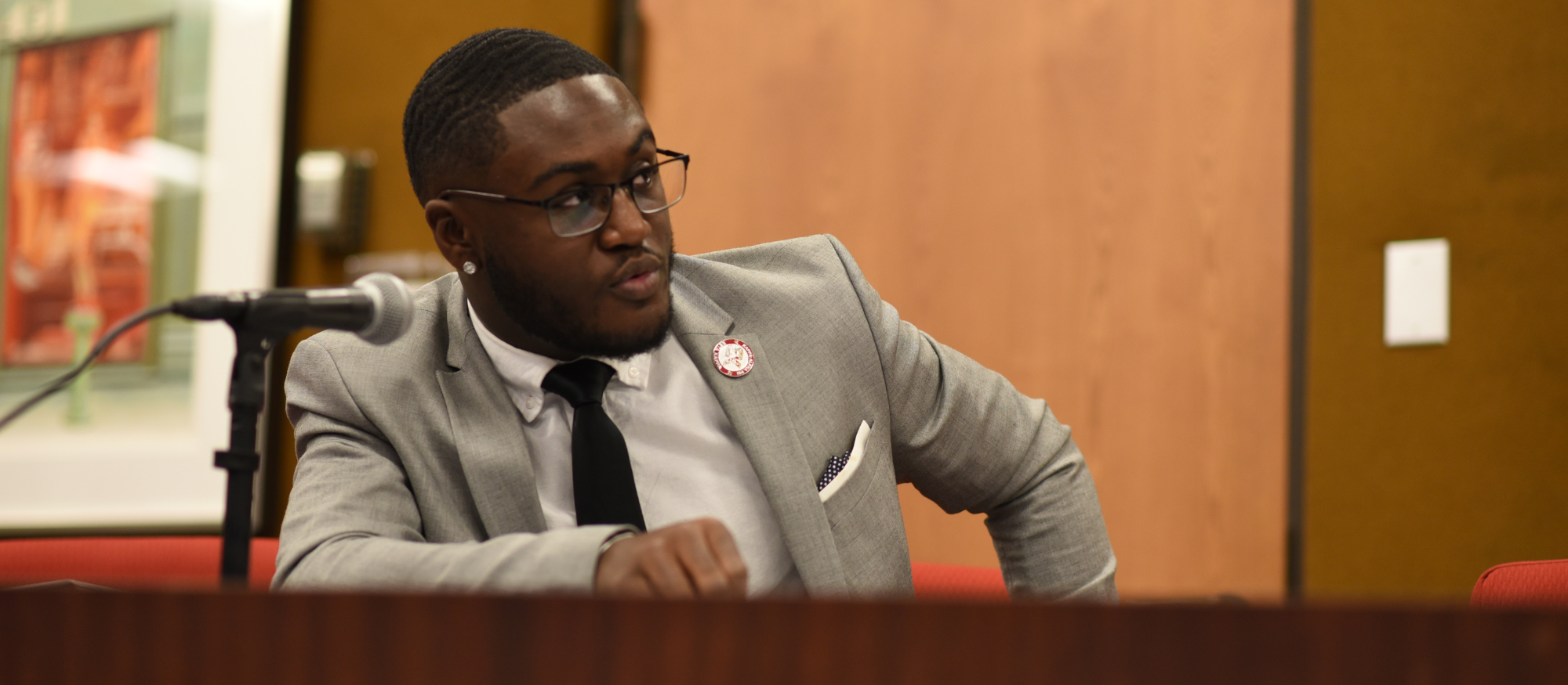 Travis Henderson, a junior in the Business Administration program, joins the Board of Trustees as the new Student Representative during the Regular Meeting of the Board of Trustees held on the Van Ness Campus on June 8.